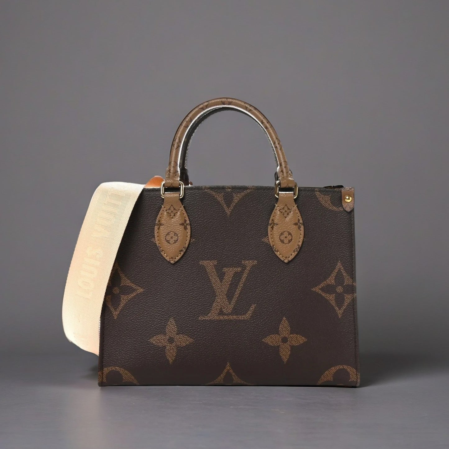 Reverse Monogram Giant Onthego PM