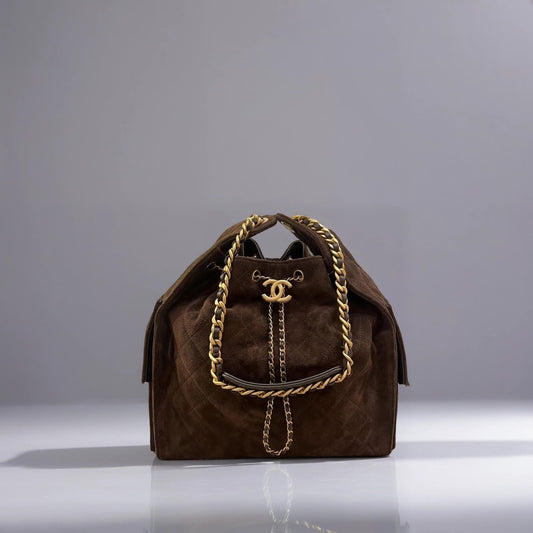Suede Quilted Medium Chanel 25 Handbag Brown