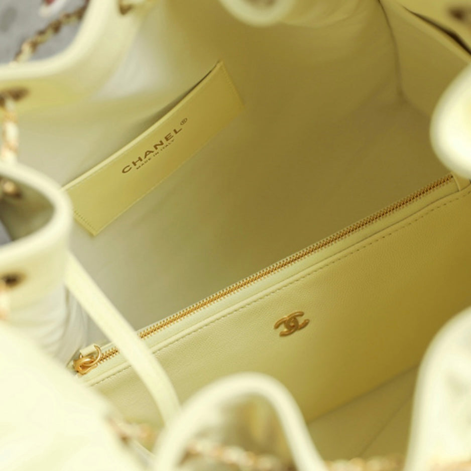 Caviar Quilted Medium Chanel 25 Handbag Light Yellow