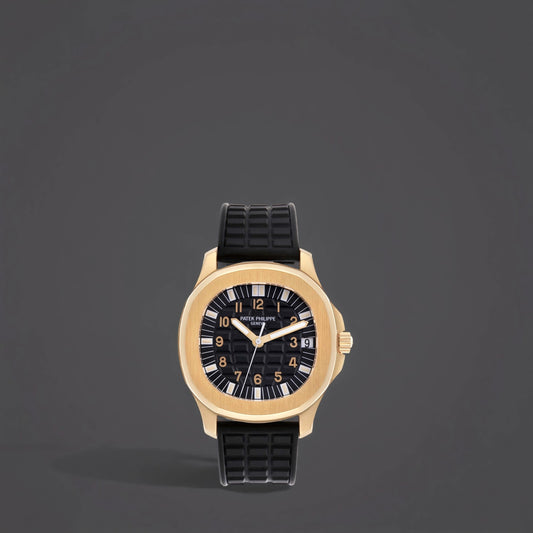 Patek Philippe Aquanaut Yellow Gold Black Dial Watch