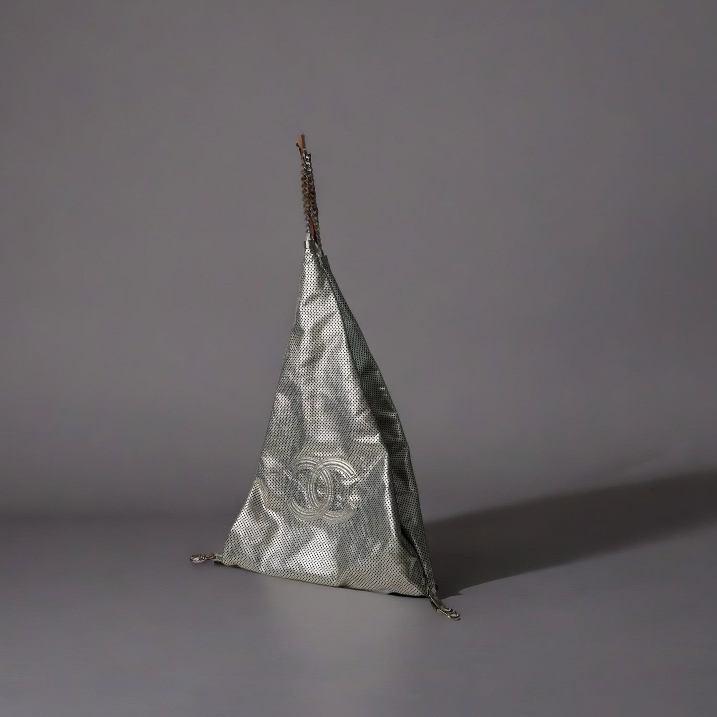 Metallic Glazed Calfskin Perforated XL Rodeo Drive Triangle Tote Silver