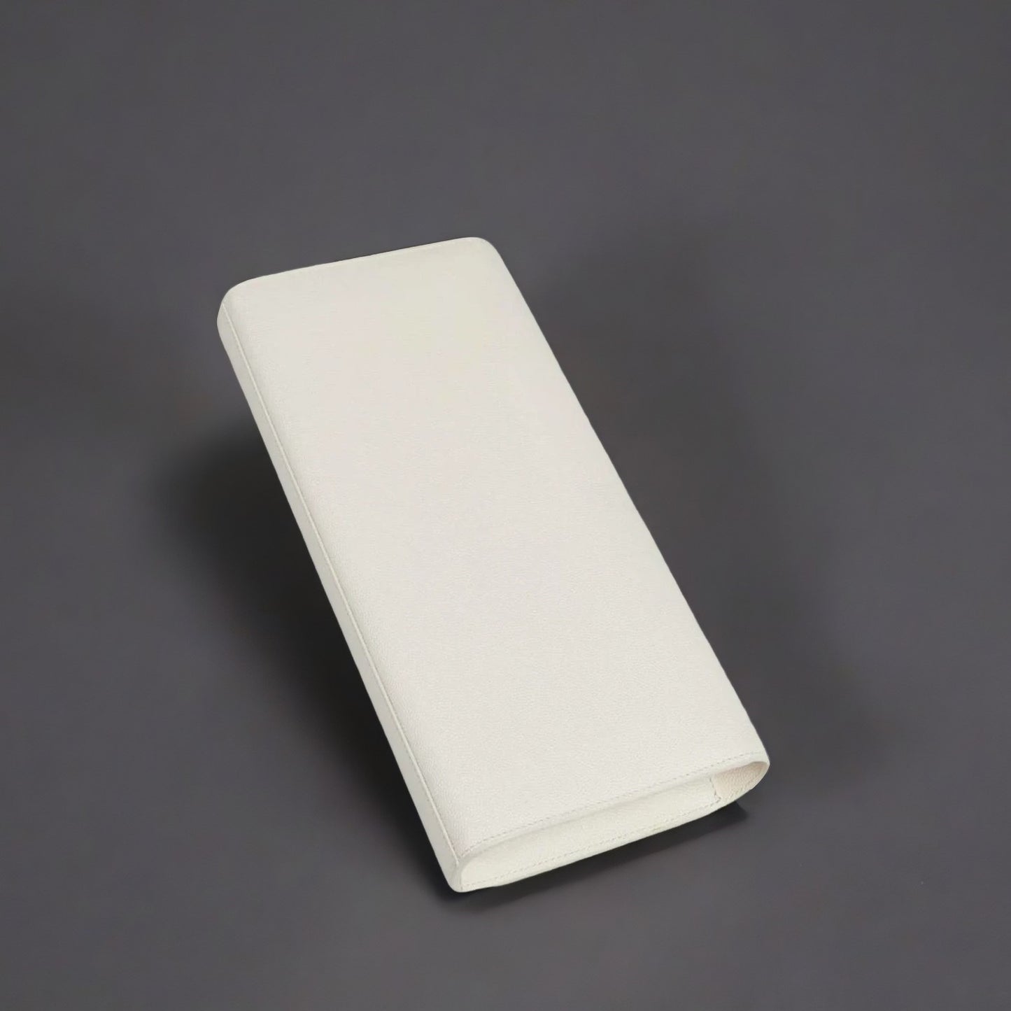 White Pebbled Leather Cassandre Clutch Bag