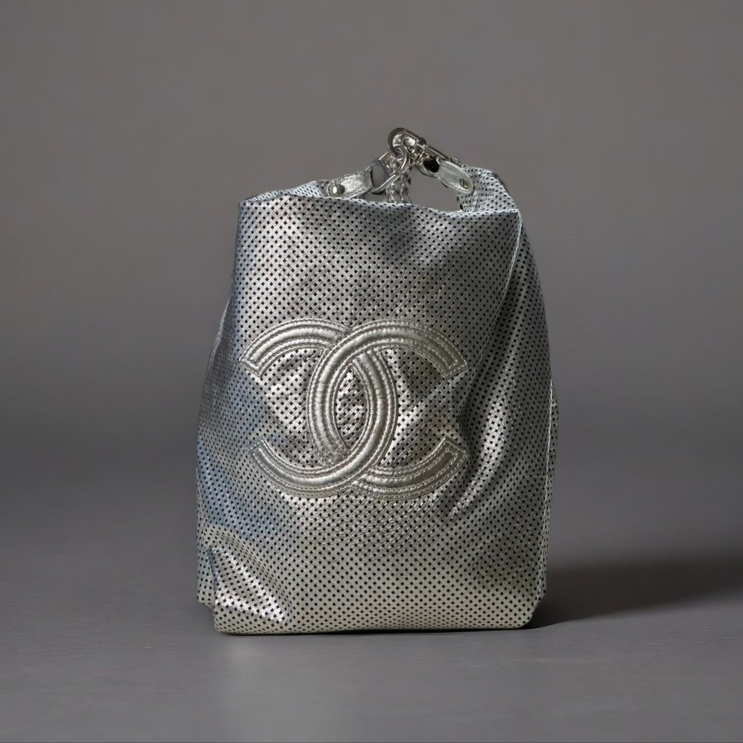 Metallic Glazed Calfskin Perforated XL Rodeo Drive Triangle Tote Silver