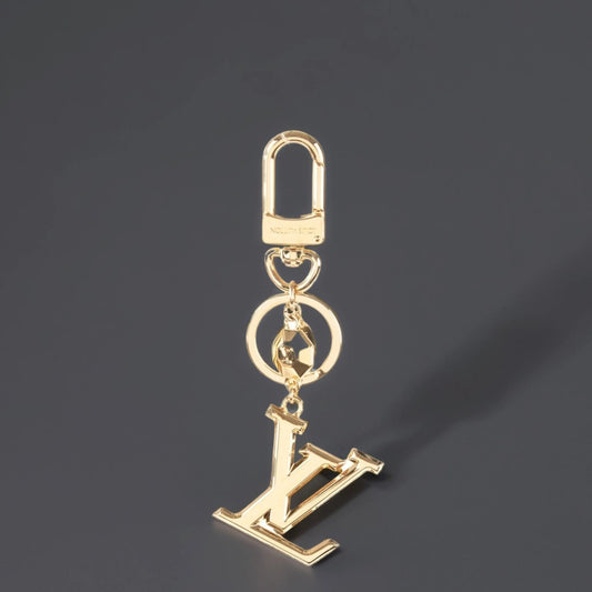 LV Facettes Bag Charm Key Holder Gold