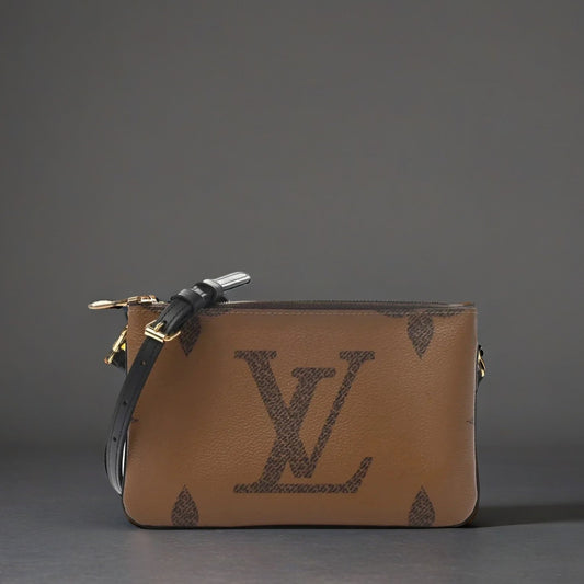 Reverse Monogram Giant Double Zip Pochette