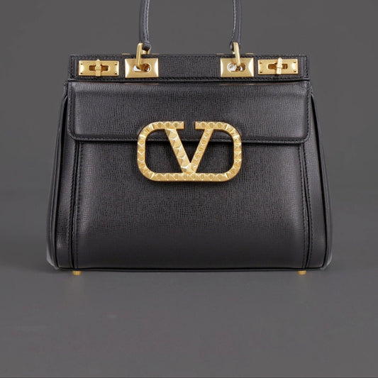 Valentino Garavani - Leather medium Rockstud Alcove bag